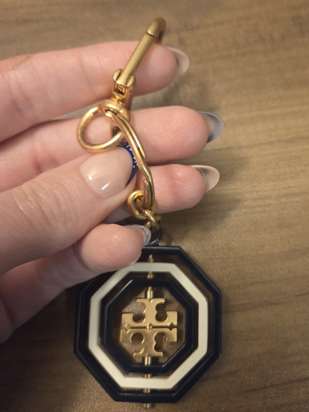 Tory Burch Gold Bag Charm with Navy and Cream Octagon Logo - Picture 3 of 3